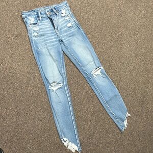 American eagle high rise blue ripped jegging crop